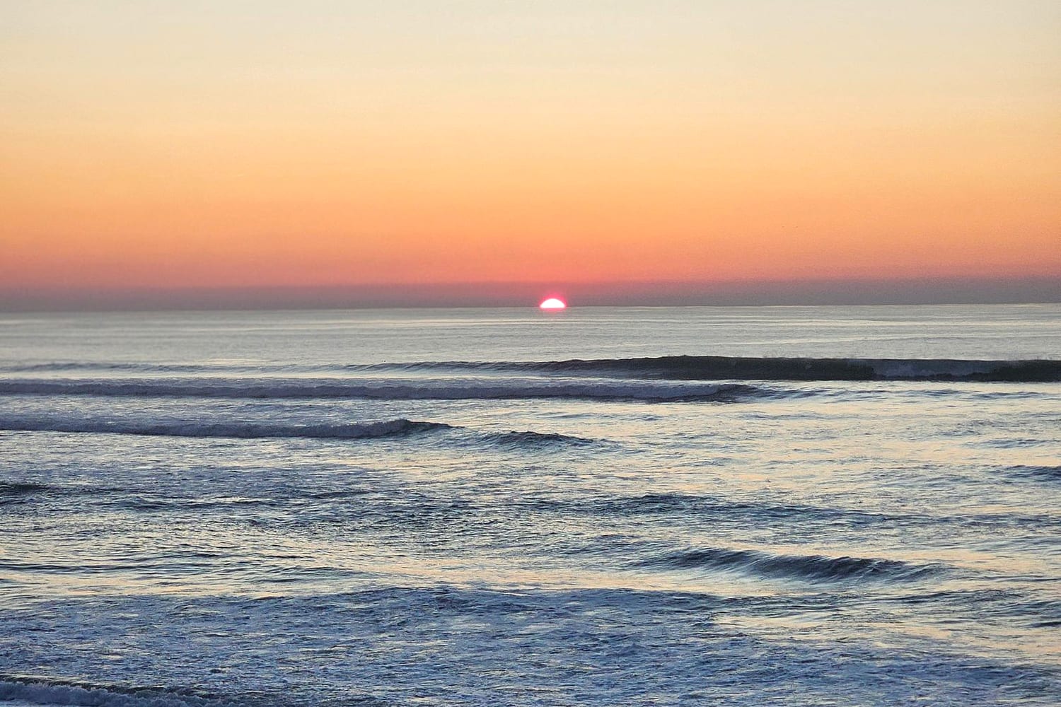 Calm ocean at sunrise on the Northern Beaches